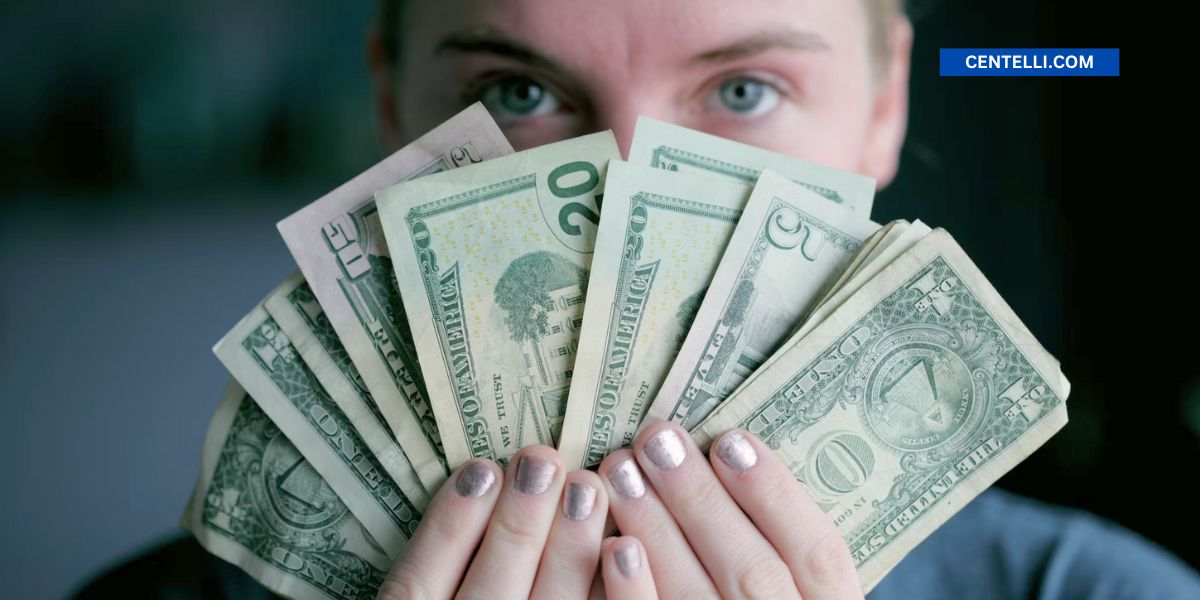 Person covering face with cash